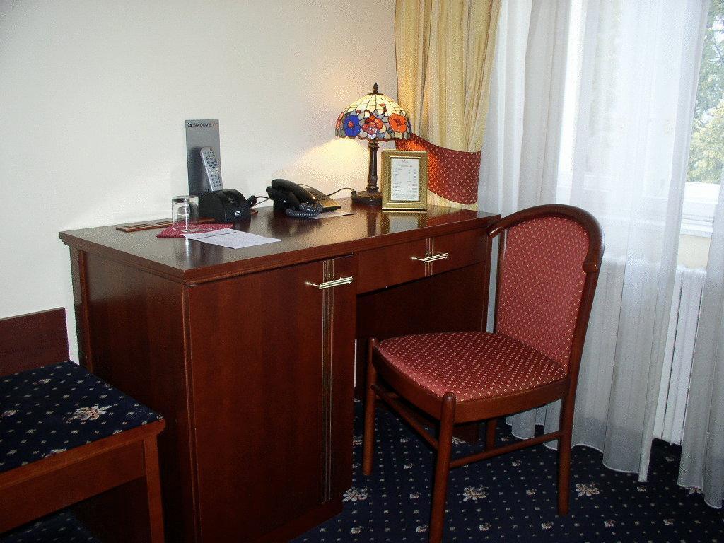 Aramis Hotel Praga Quarto foto